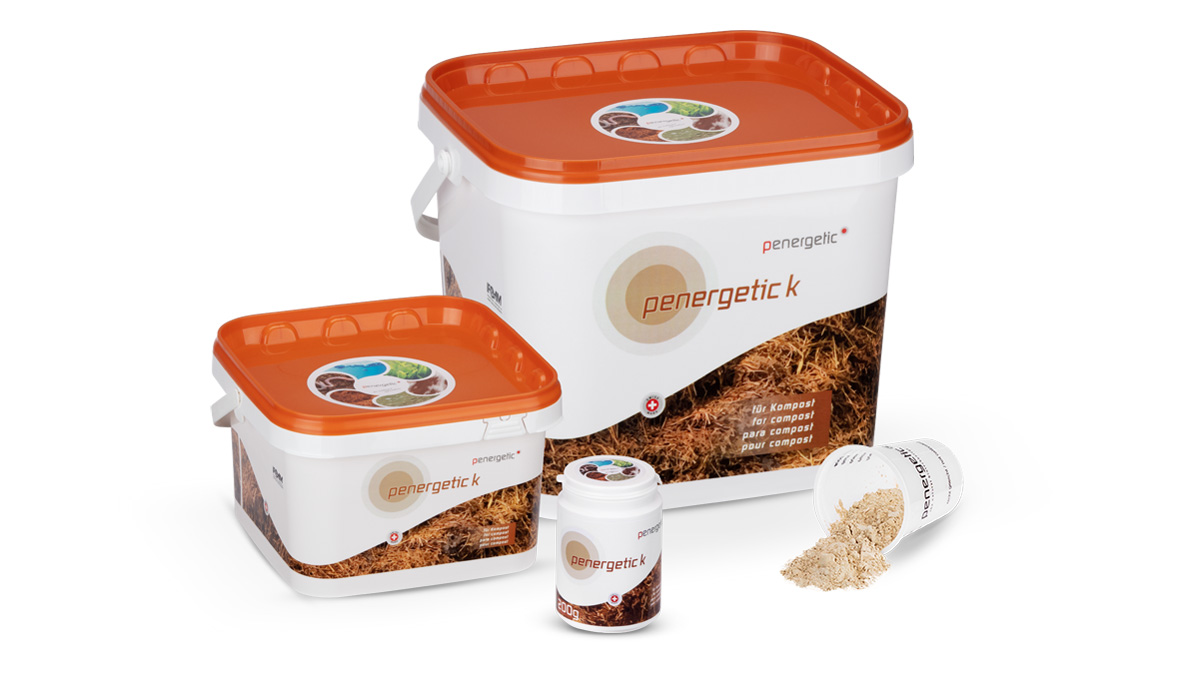 Penergetic K product packaging showing different sizes - large bucket, medium bucket, and small canister with orange lids